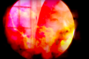 Baylina Pu double-exposed against an image of the moon;